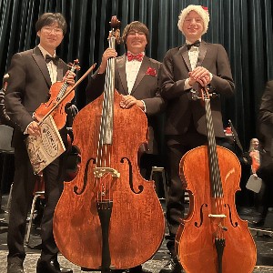 Students with stringed instruments